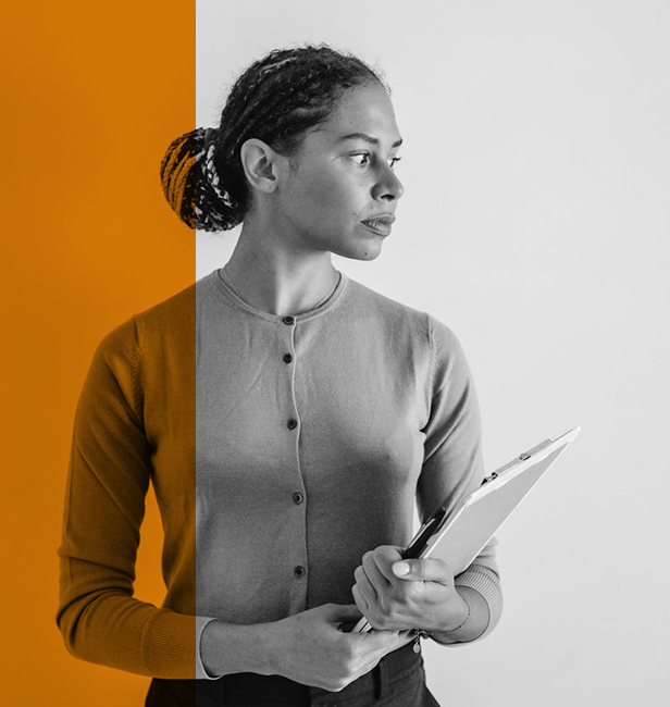 woman holding a clipboard