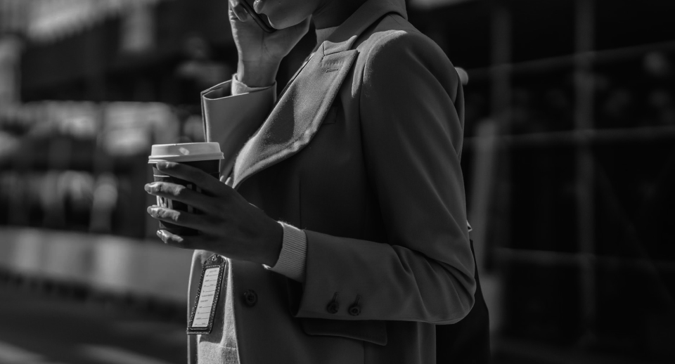 someone holding a cup